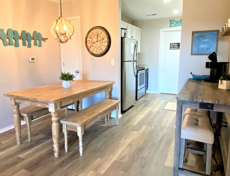 Open floor plan between dining areas, kitchen and family room area