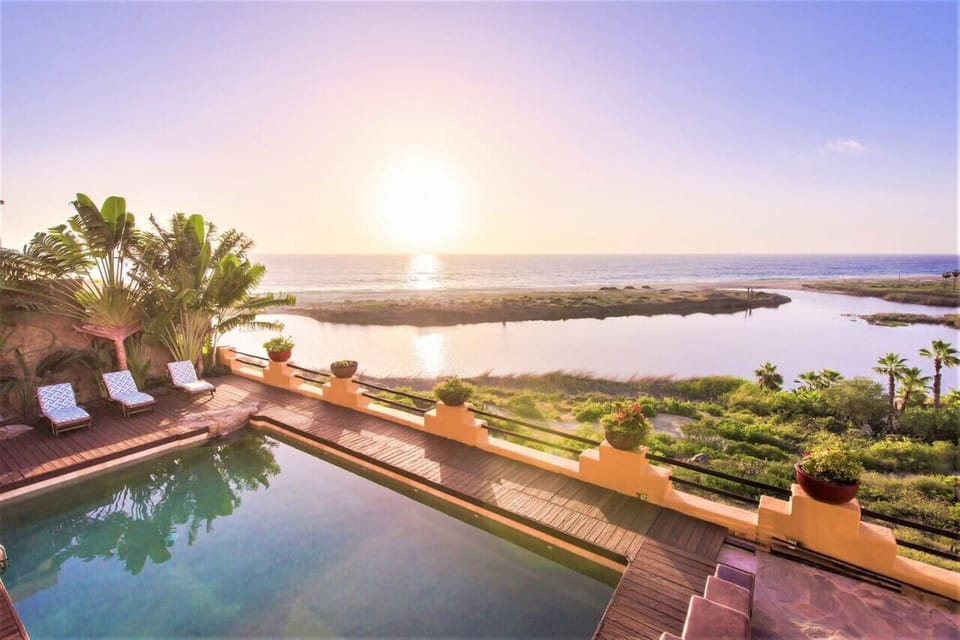 Unreal views of the Pacific Ocean from the balcony of this beautiful home. Pool, spa, outdoor dining, outdoor lounging, and more!