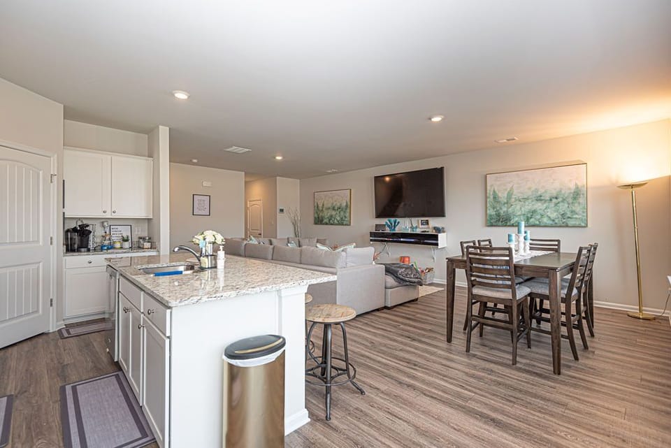 Dining Room, 6 dining chairs, kitchen island with 3 stools. 