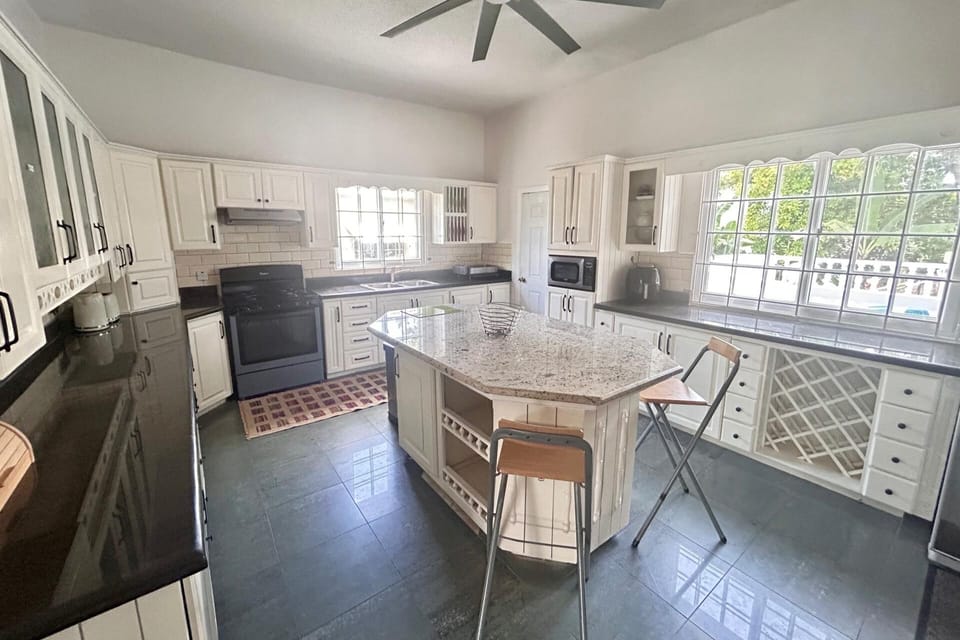 Villa | Private kitchen | Coffee/tea maker, fridge, microwave, oven