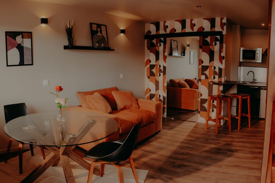 Premium Studio | Living area | 80-inch Smart TV with cable channels, TV, Netflix