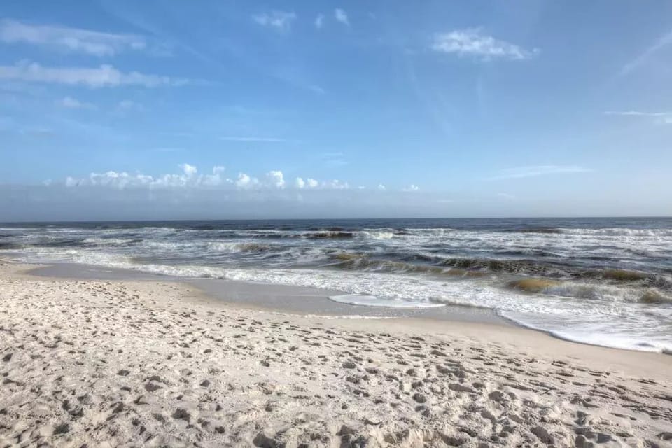 Beautiful white sugar sand on Perdido Key right outside. Volleyball courts too!