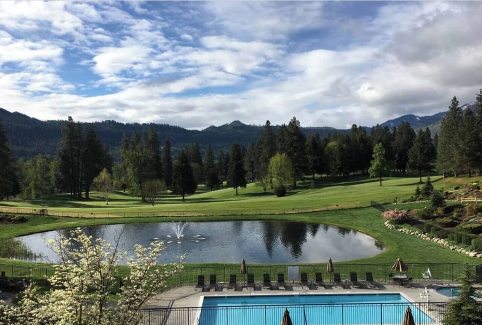This is the view from our back balcony, the pool, hot tub, pond, and the 14th green of the golf course. The nicest view from all of the condo's in this complex. 