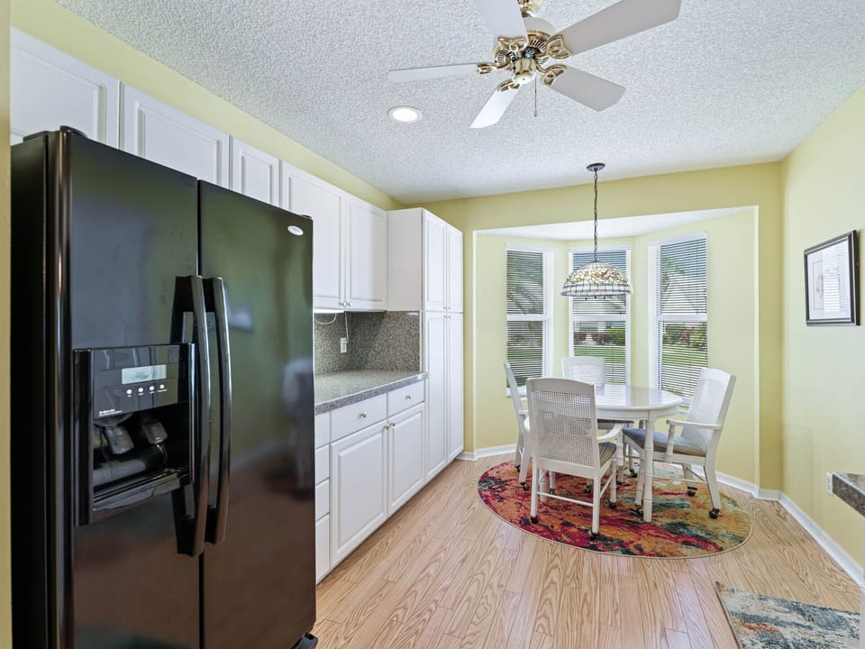 To the right of the front entry is this sunny, efficient kitchen and dining nook