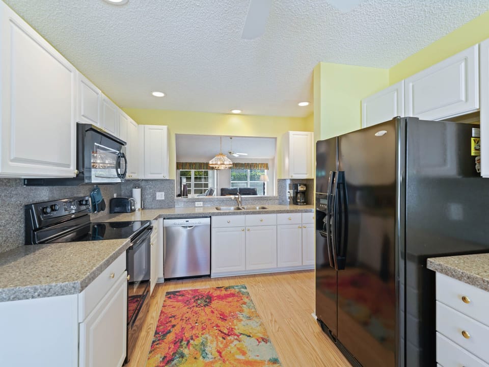 Granite counters, new appliances, clean cabinetry make cooking fun 