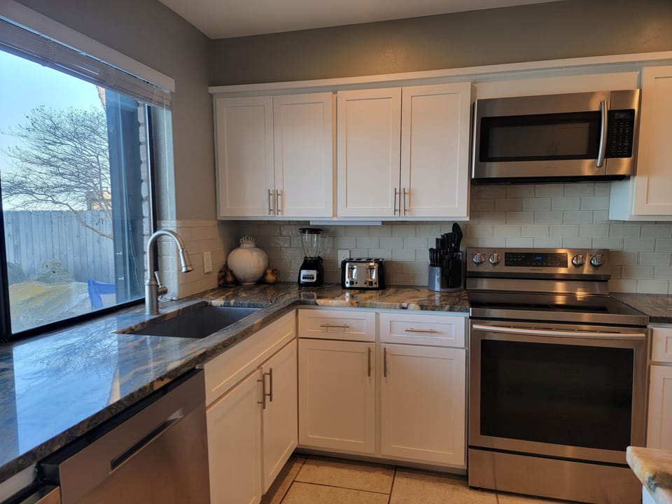 Kitchen comes fully furnished. Granite countertops, stainless steel appliances.