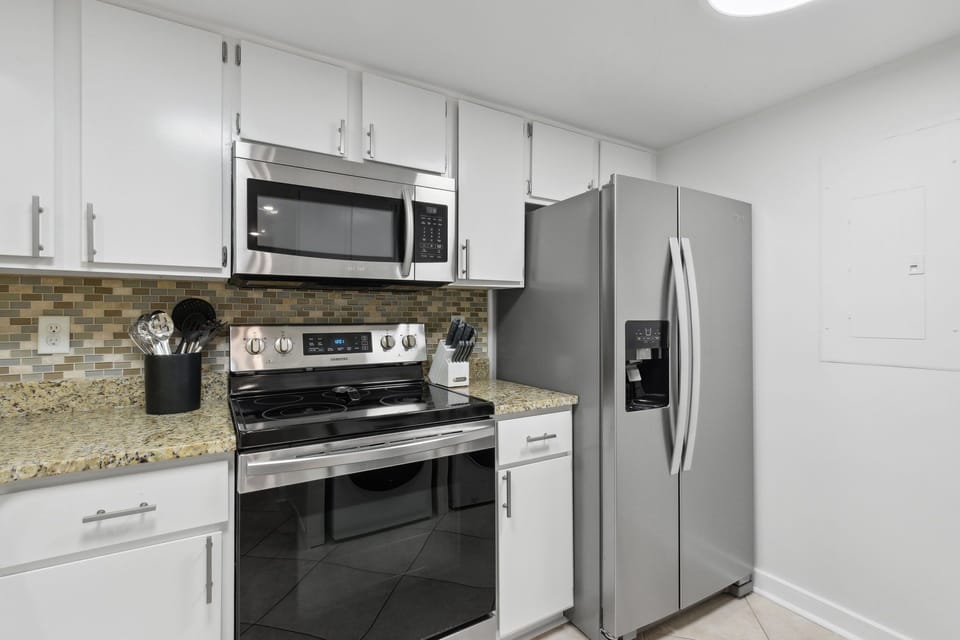 Kitchen with Granite Countertops and Stainless Steel Appliances