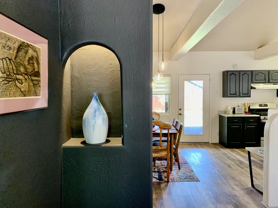 Entry hall with view into the kitchen/dining areas