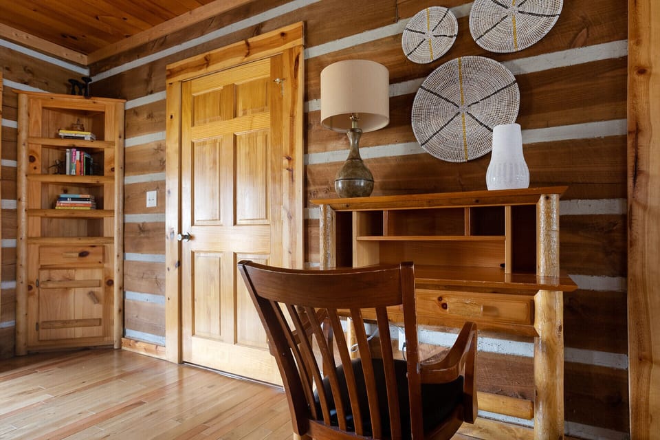 Workspace with accessible outlets and USB ports. Books for all ages provided.