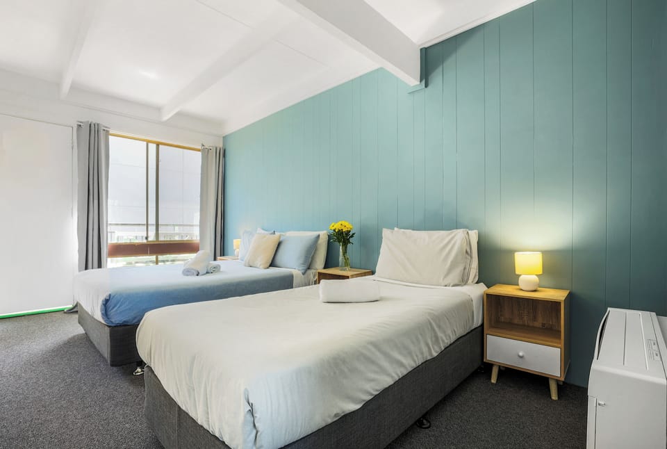Classic Triple Room | Individually furnished, desk, laptop workspace, blackout drapes