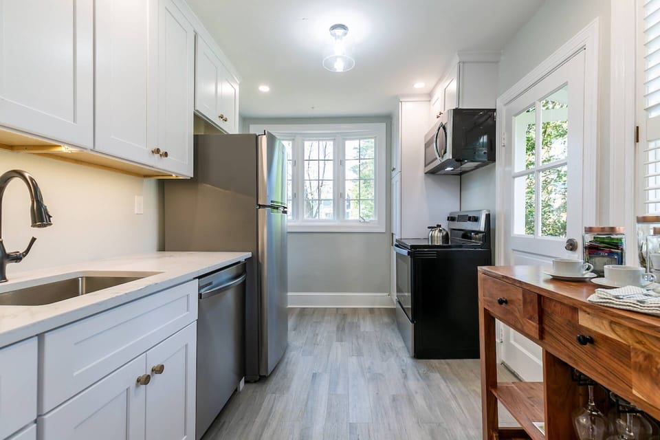 The fully-renovated kitchen has all new appliances and fixtures.