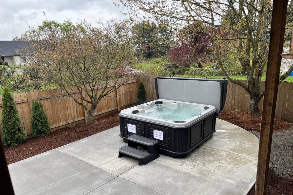 The hot tub is a favorite amenity perfect during warm summers and enchanting winters.