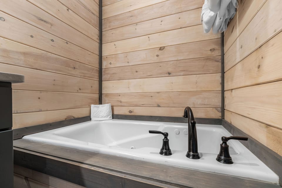 Spacious Bath with Jetted Tub, Shower & Dual Vanity