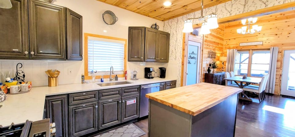 Spectacular custom kitchen, spacious cortz counter tops, deep farm sink, butcher block island