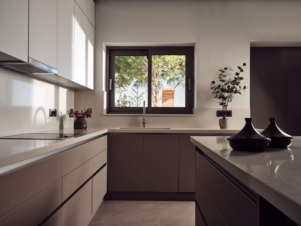 Featuring a kitchen island for ultimate space and comfort.