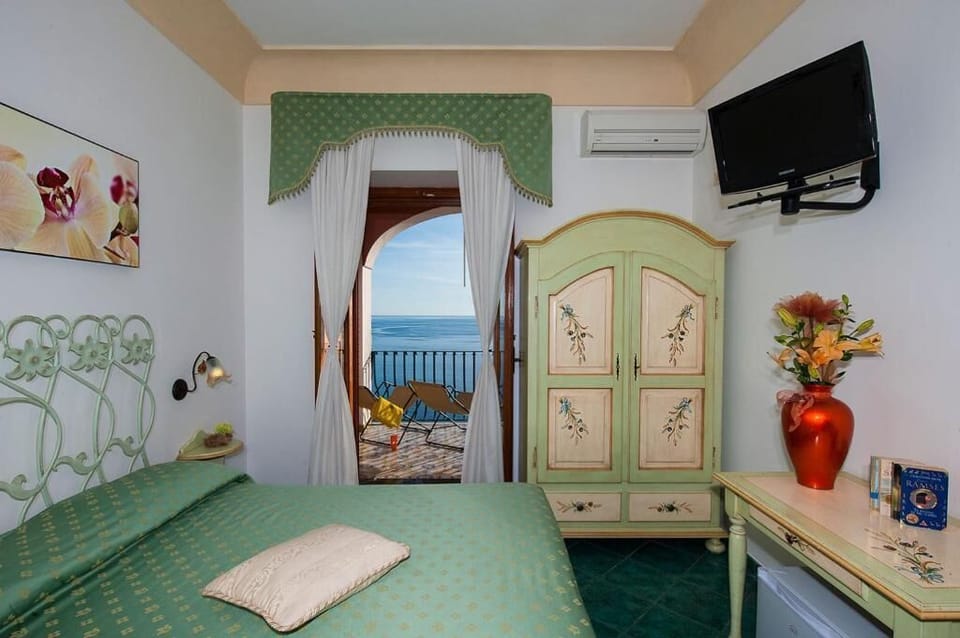 Panoramic Double Room, Sea View | Minibar, individually furnished, desk, laptop workspace