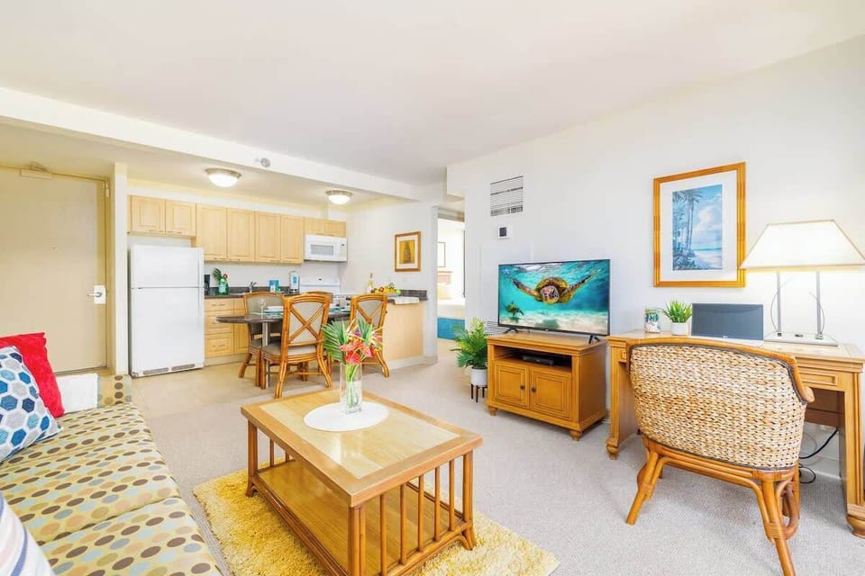 Overview of the living room. Cable TV and designate work space