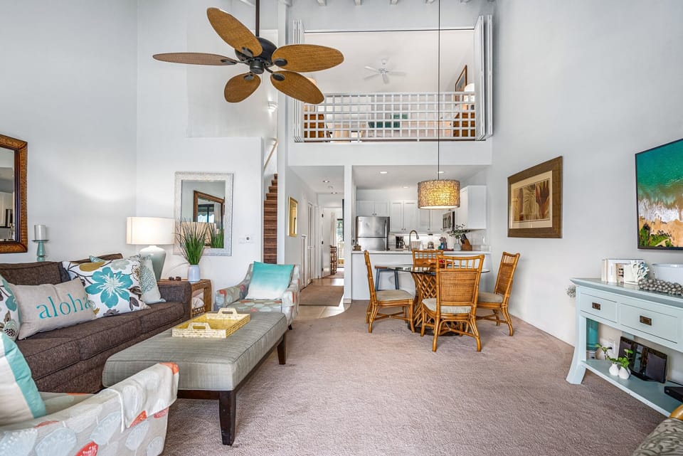 Spacious living room leads to a loft