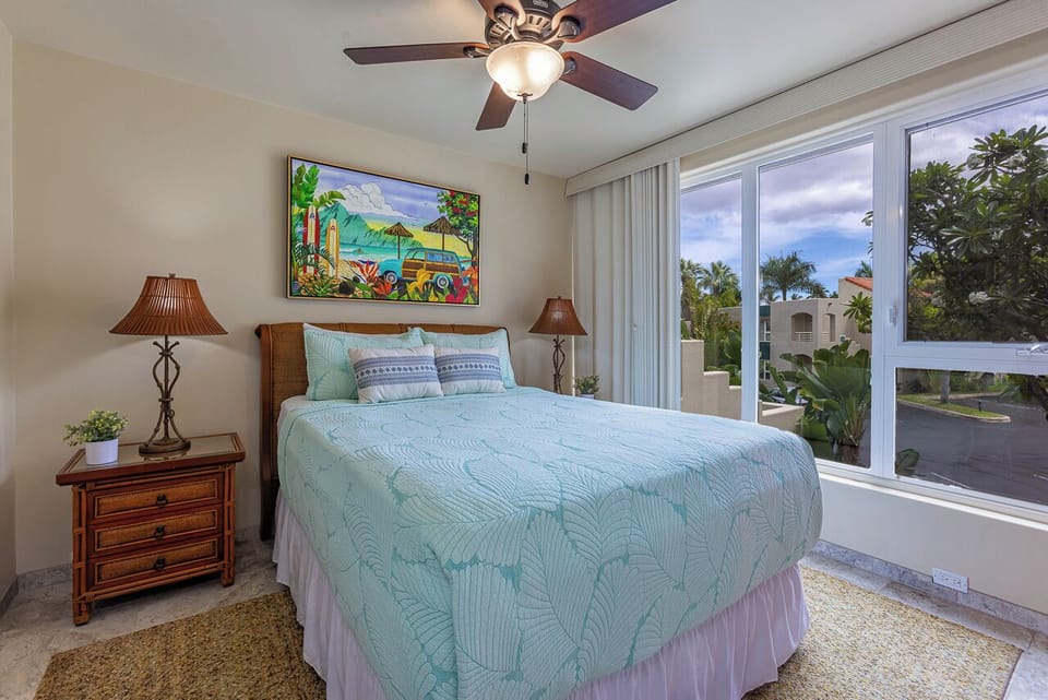 Guest bedroom offers a queen size bed