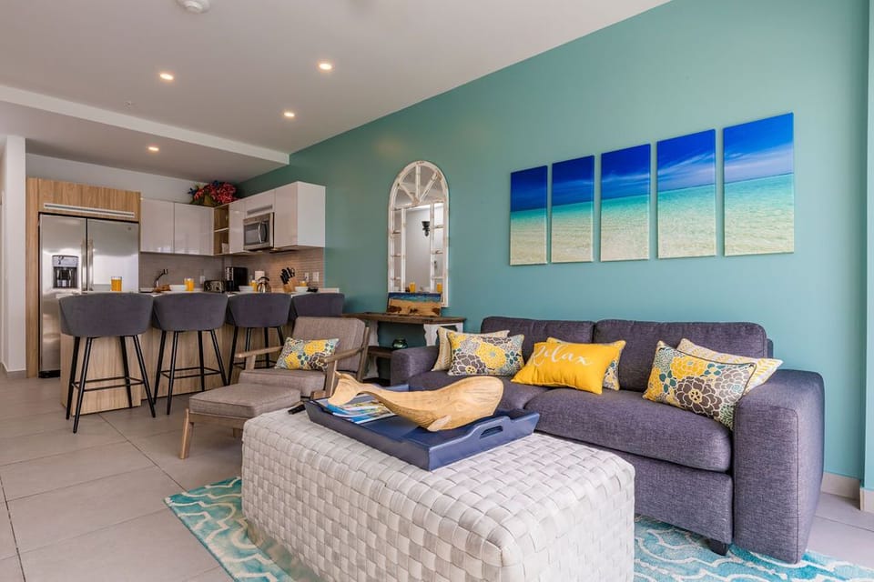 Step into your bright, modern bathroom with a spacious walk-in shower, sleek fixtures, and thoughtful touches like fresh towels and cheerful décor to make you feel right at home.