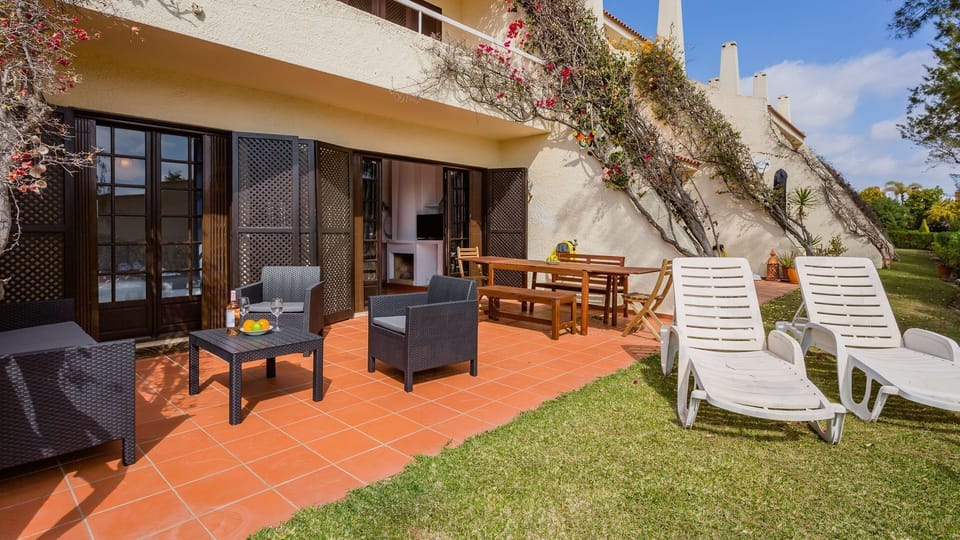 Dive into the refreshing communal pool, a sparkling oasis surrounded by lush greenery, perfect for a sunny day.
#SwimmingPool #OutdoorPool #LovelyStay