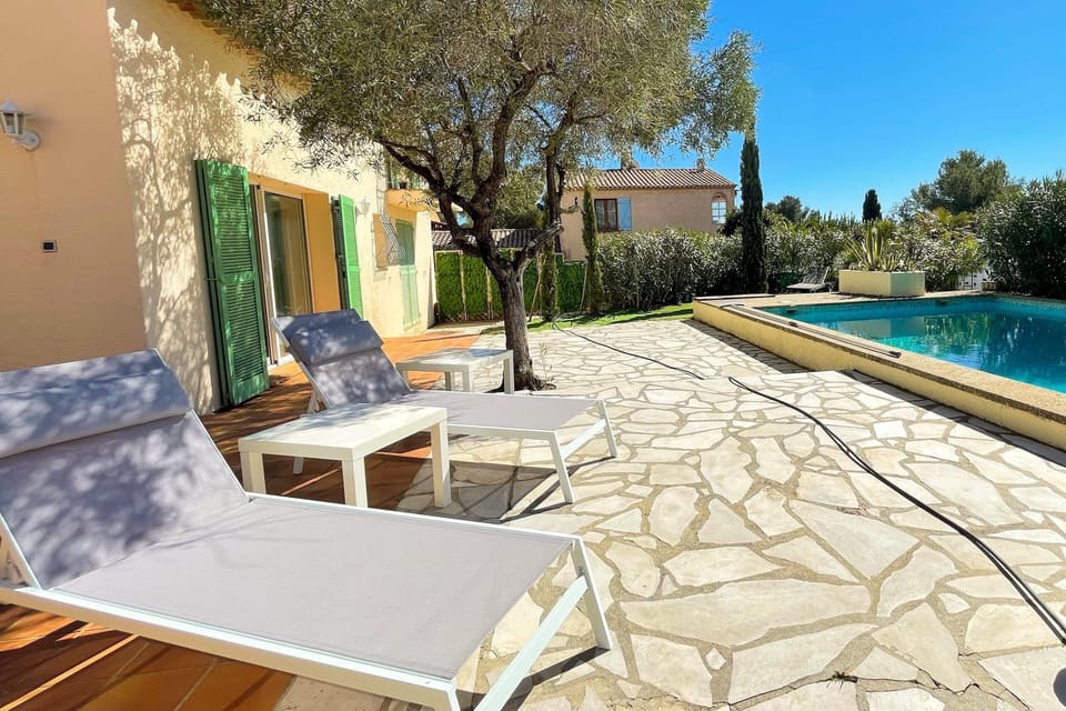 Terrace with swimming pool adjoining the living room