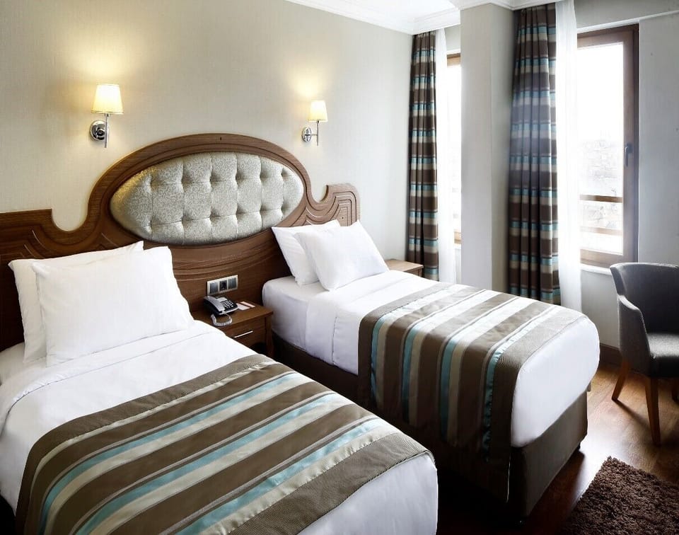 Standard Room, 1 Double or 2 Twin Beds | Minibar, in-room safe, desk, soundproofing