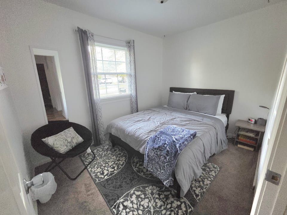 Bedroom two features a Queen bed