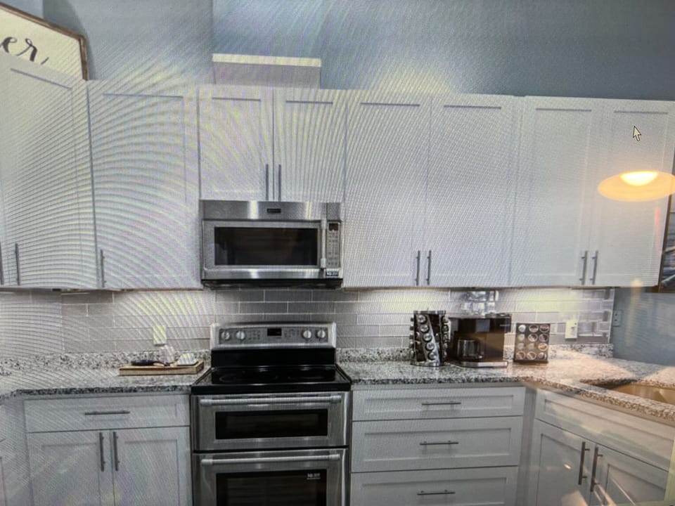 KITCHEN W/MICROWAVE WHICH VENTS OUTSIDE