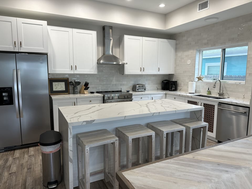 Beautiful modern chef-stocked kitchen with waterfall island!
