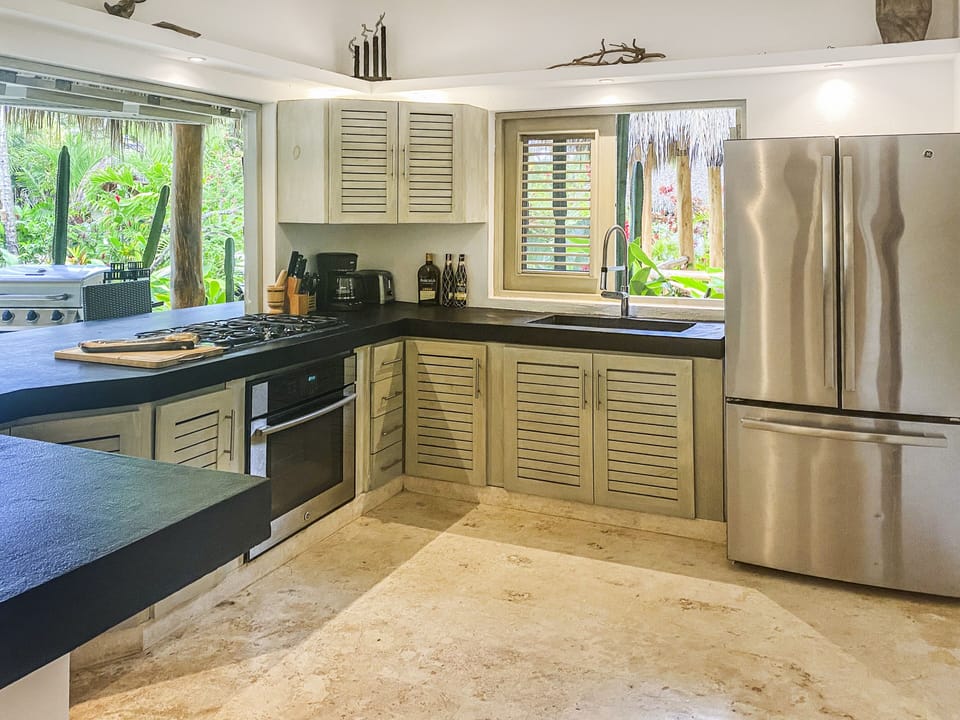 Oven, gas cooktop, microwave, refrigerator 