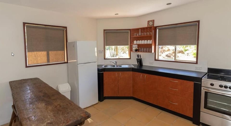 The Pump House (2BR) | Private kitchen | Electric kettle, dining table