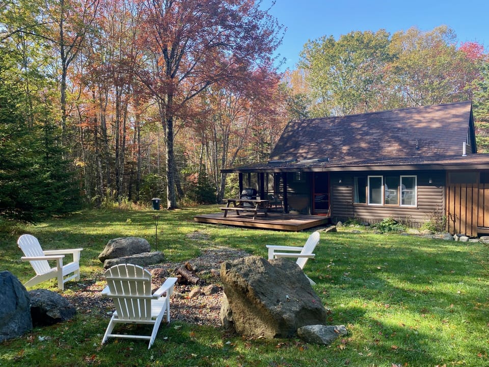 Expansive lawn with only woods beyond on 2 secluded acres.