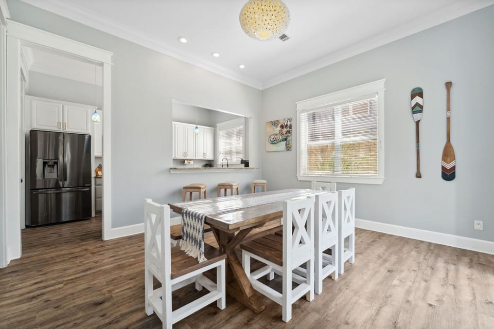 8 seat dining table and 3 seat breakfast bar