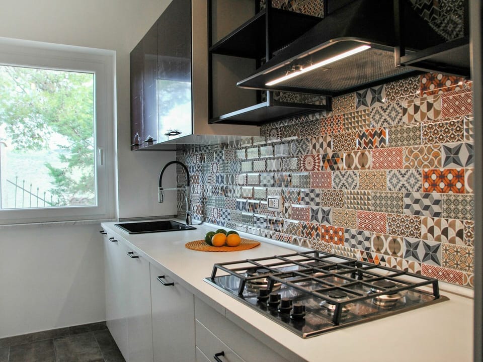 Cabinetry, Countertop, Property, Gas Stove, Window, Kitchen Stove, Kitchen, Kitchen Sink, Kitchen Appliance, Cooktop
