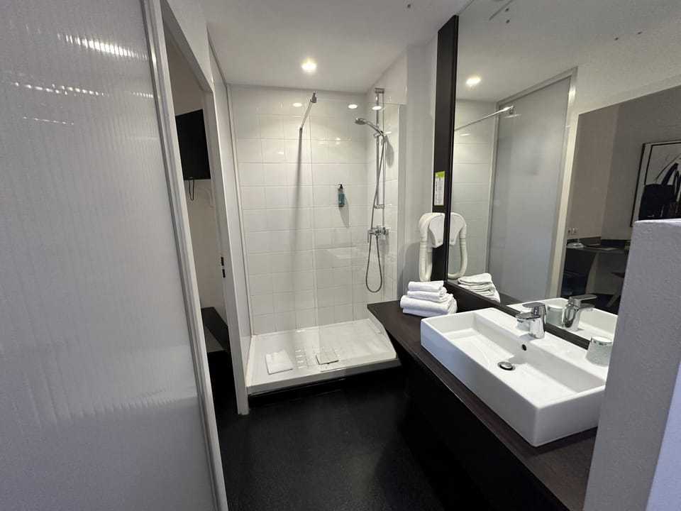 Shower, free toiletries, hair dryer, towels