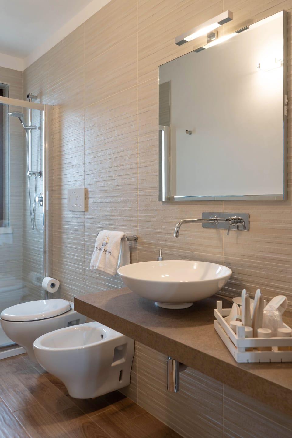 Shower, hair dryer, towels, toilet paper