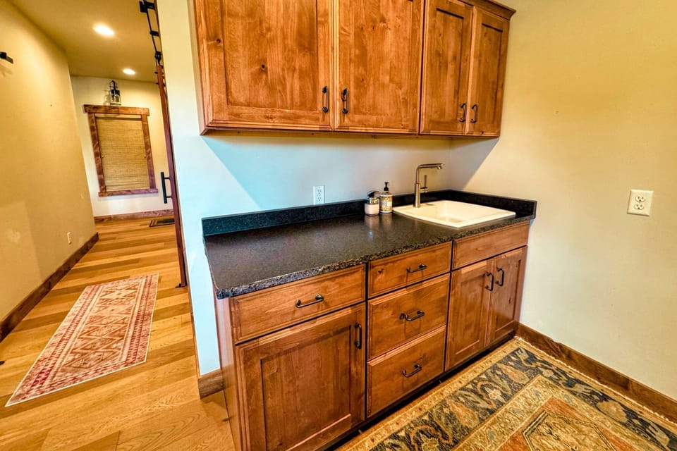 Make use of the wet bar off of the living room to prepare drinks and other goodies.