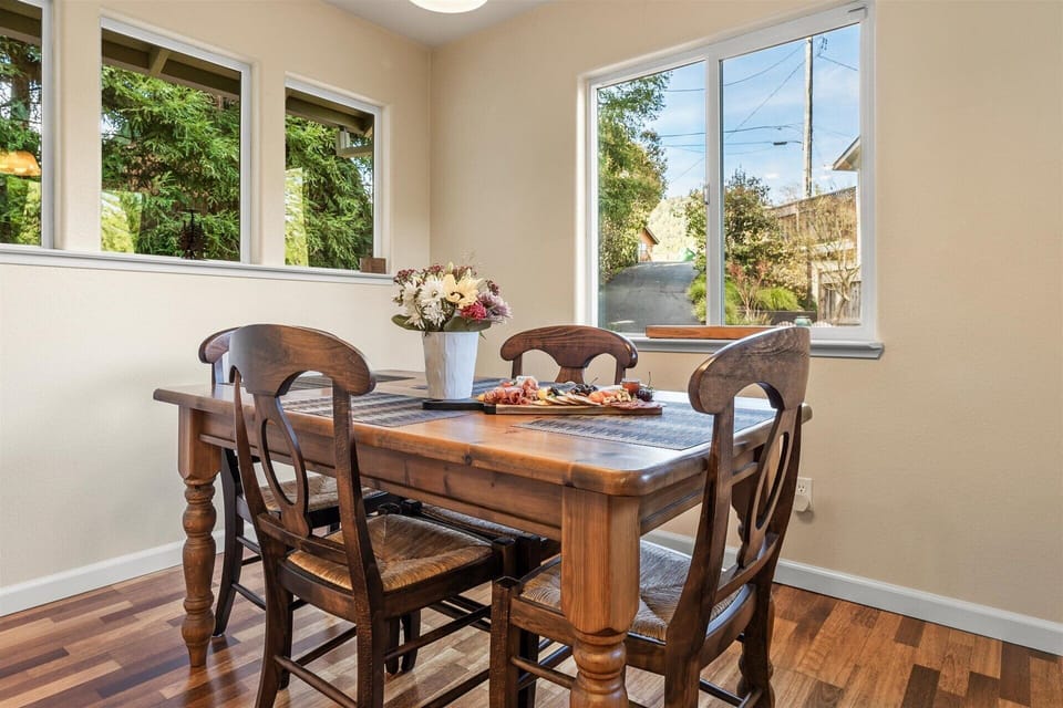 Sweet dining nook surrounds you with natural light