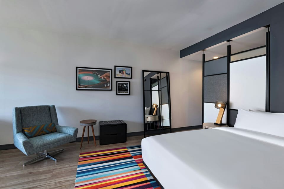 Suite, 1 King Bed, Pool View | Down comforters, pillowtop beds, in-room safe, iron/ironing board