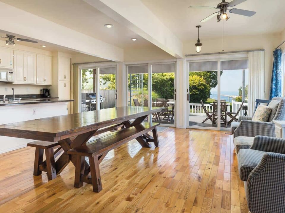 Dine in the Bright and Spacious Area with Stunning Views of the Black River