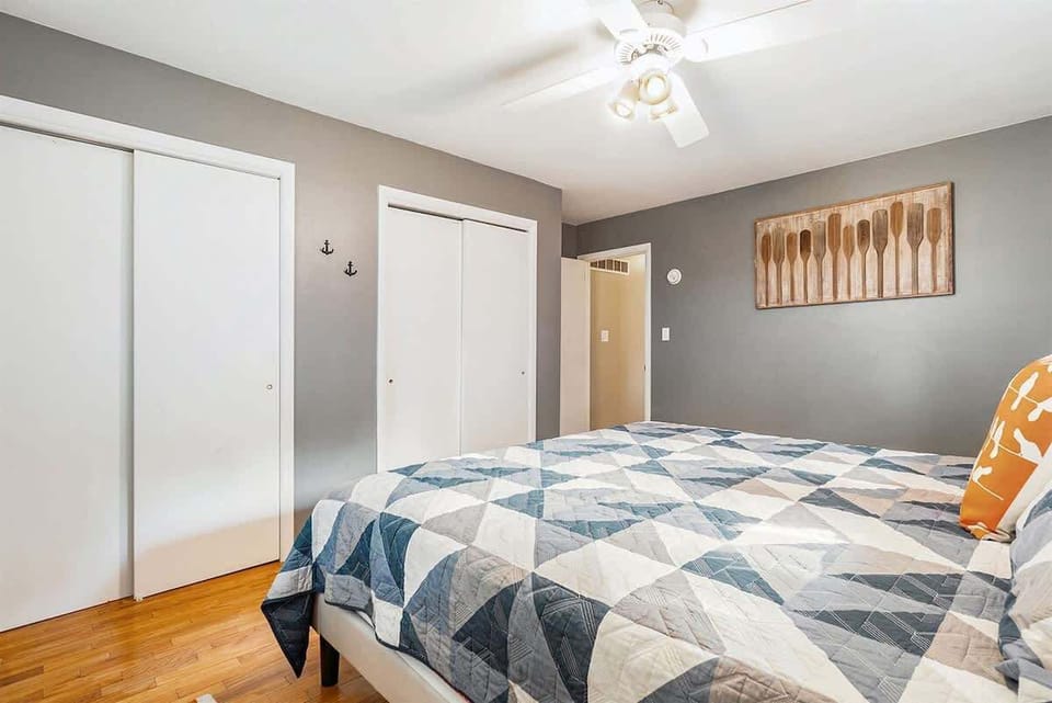 Rejuvenation Awaits in the Luxurious Master Suite with its Plush Bedding and Soothing Decor