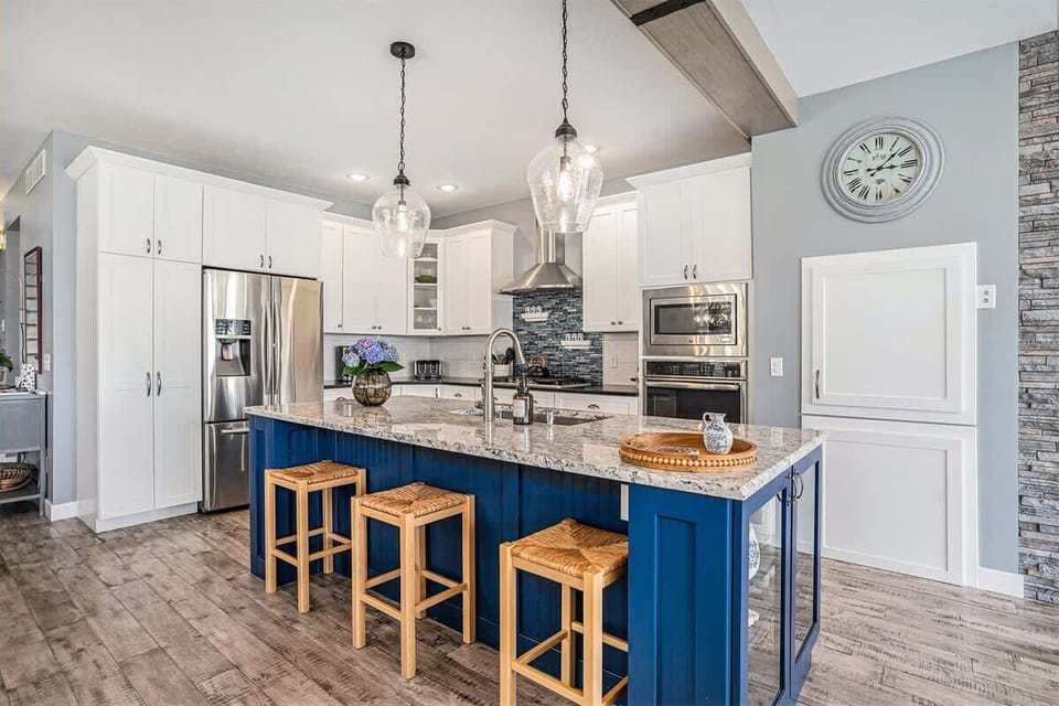 Embrace Your Inner Chef in Blueberry Bluff`s Kitchen - Complete with Ample Counter Space and Island Seating for 3