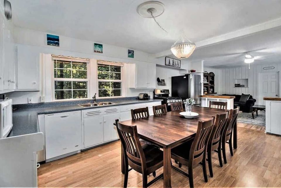 Make Your Way to the Kitchen to Share Meals, Make Memories, and Reconnect Around Webster House`s Large Dining Table