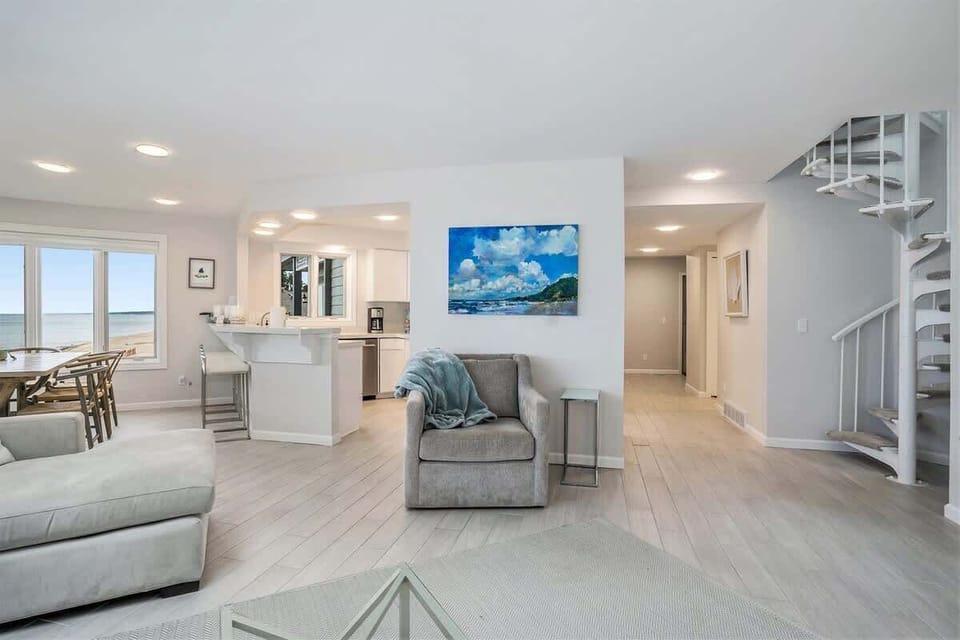 Living Room, Dining Room and Kitchen, all with Lake Views