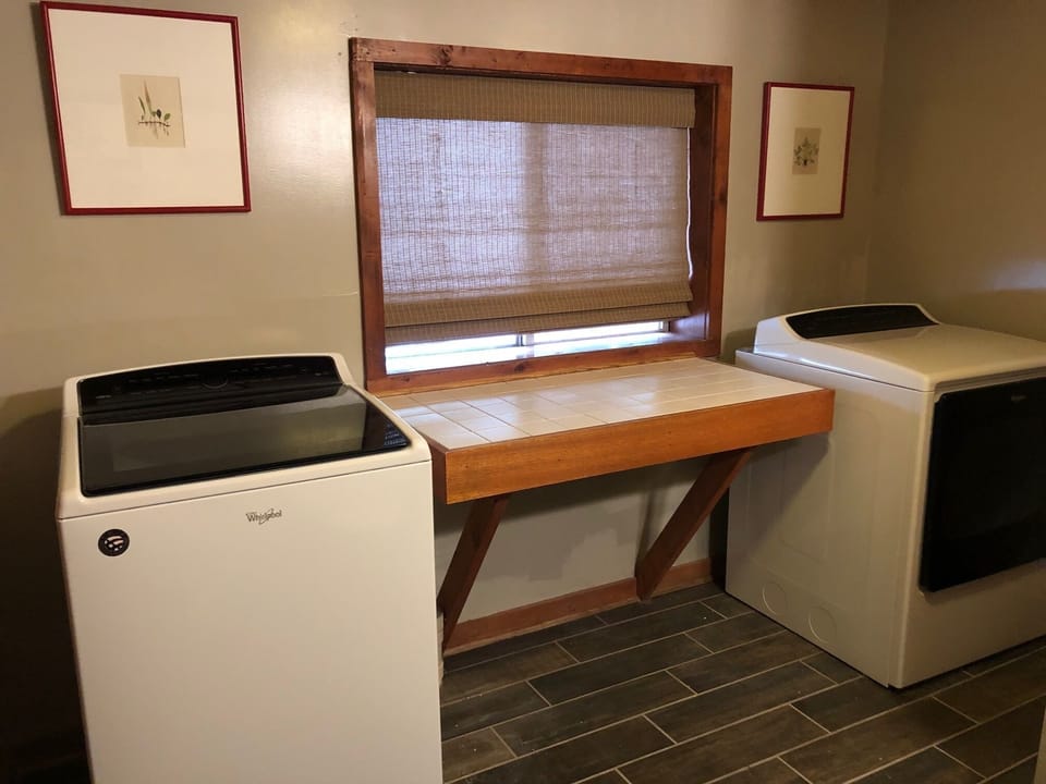 First floor bathroom with laundry and shower. The Holiday House @ Hideaway Point