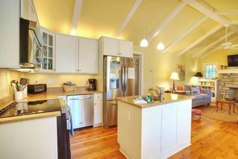 Kitchen opening to living area