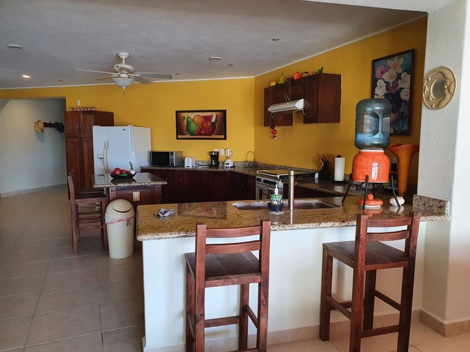 Kitchen, island, and bar