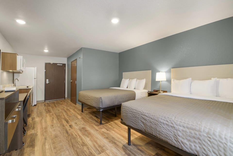 Standard Room, 2 Queen Beds, Non Smoking | Desk, bed sheets