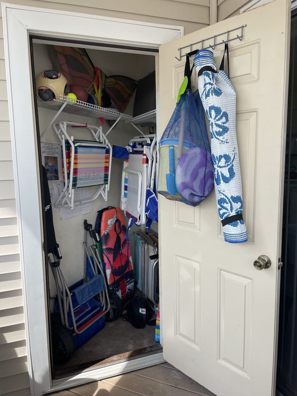 Our beach closet with chairs, umbrellas, beach cart and beach toys for your use!